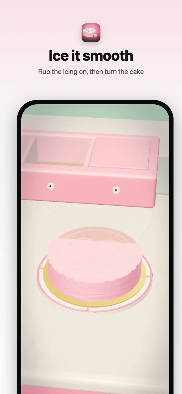 Icing a cake on the turntable in the bakery