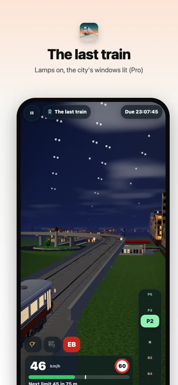 The last train at night, its lamps on and the city's windows lit
